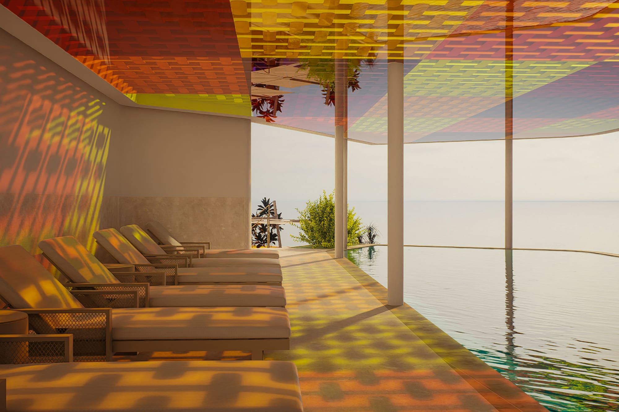 a pool with chairs and a view of the ocean