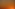 Vibrant orange sunset over dark ocean, with bright sun disk near the horizon.