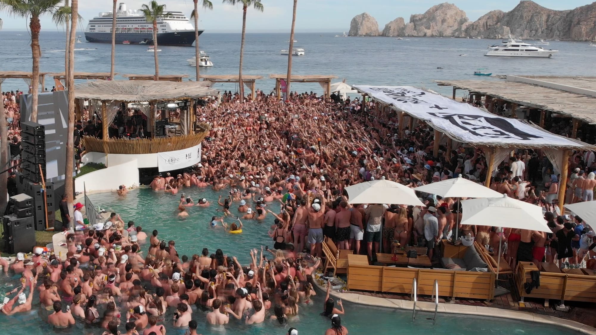 a large crowd of people in a pool