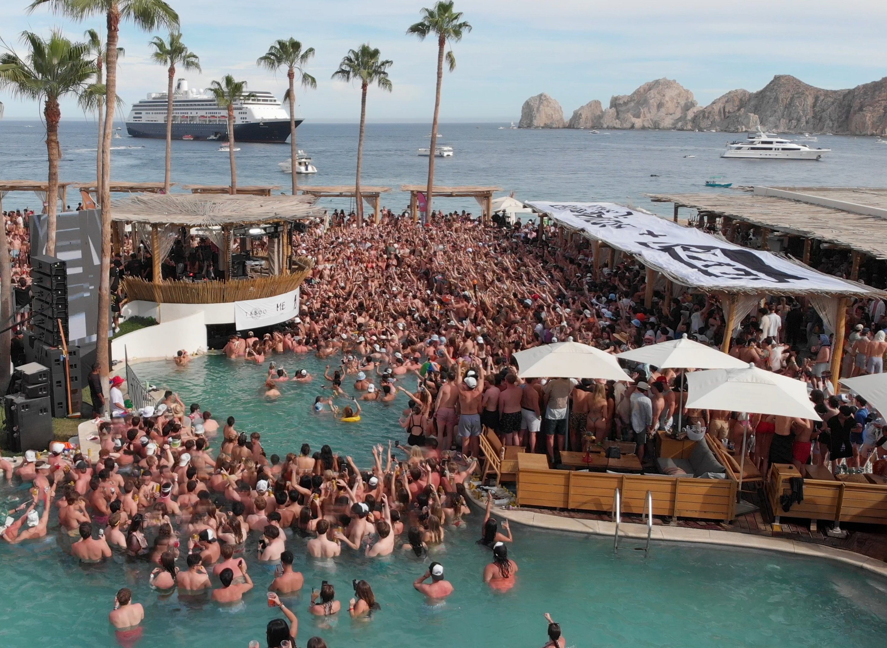 a large crowd of people in a pool