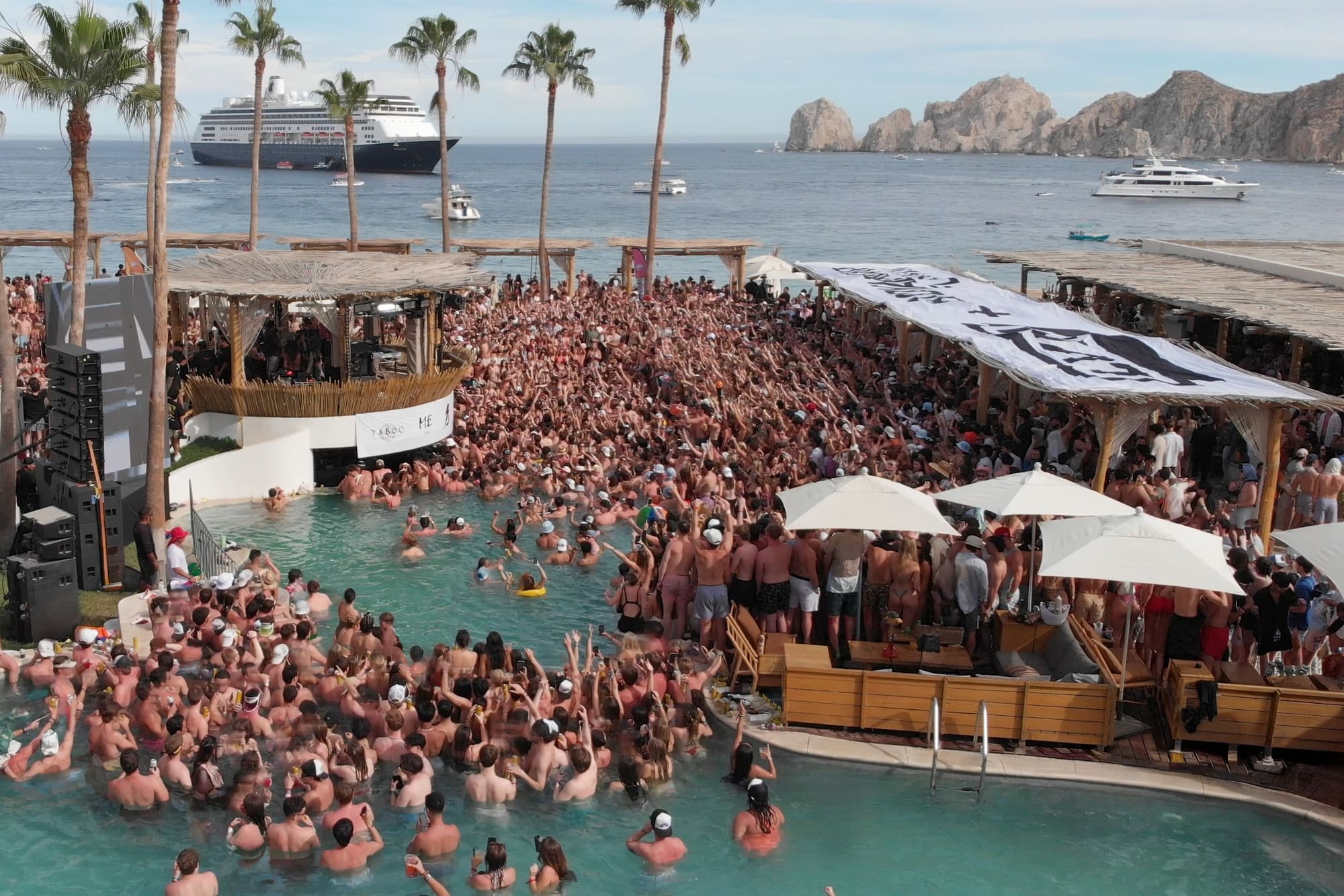 a large crowd of people in a pool