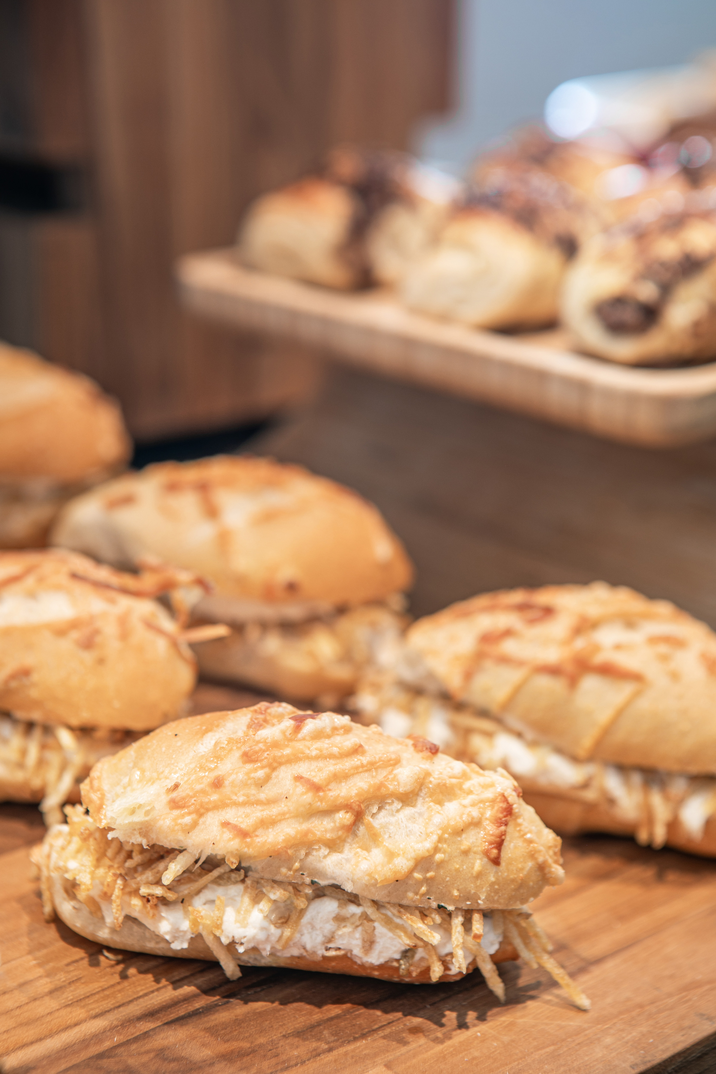 Savory cheese rolls with creamy filling and crispy potato straws.