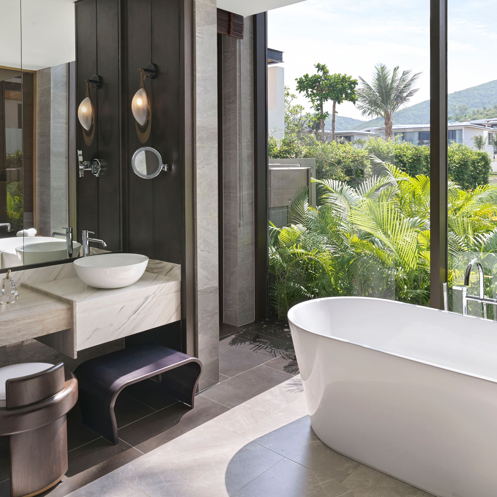 a bathroom with a tub and sink