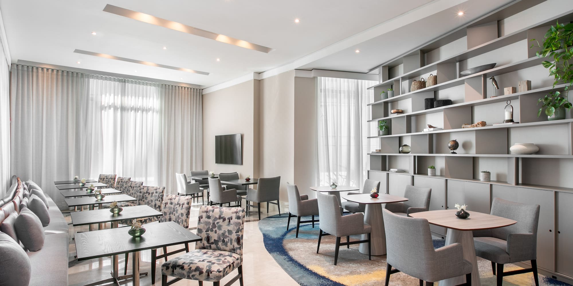 a room with tables and chairs