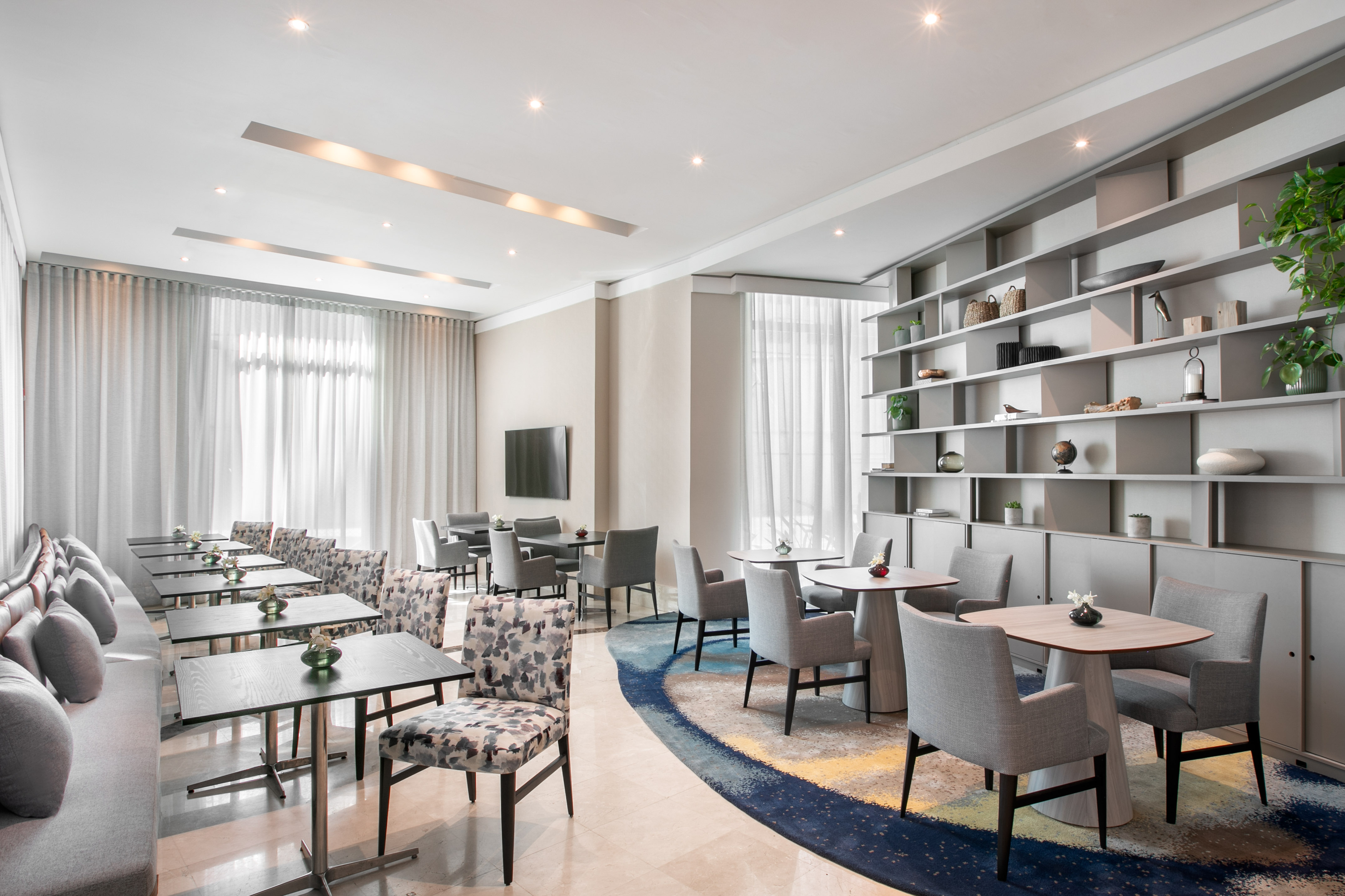 a room with tables and chairs