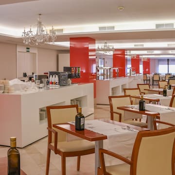 a room with tables and chairs