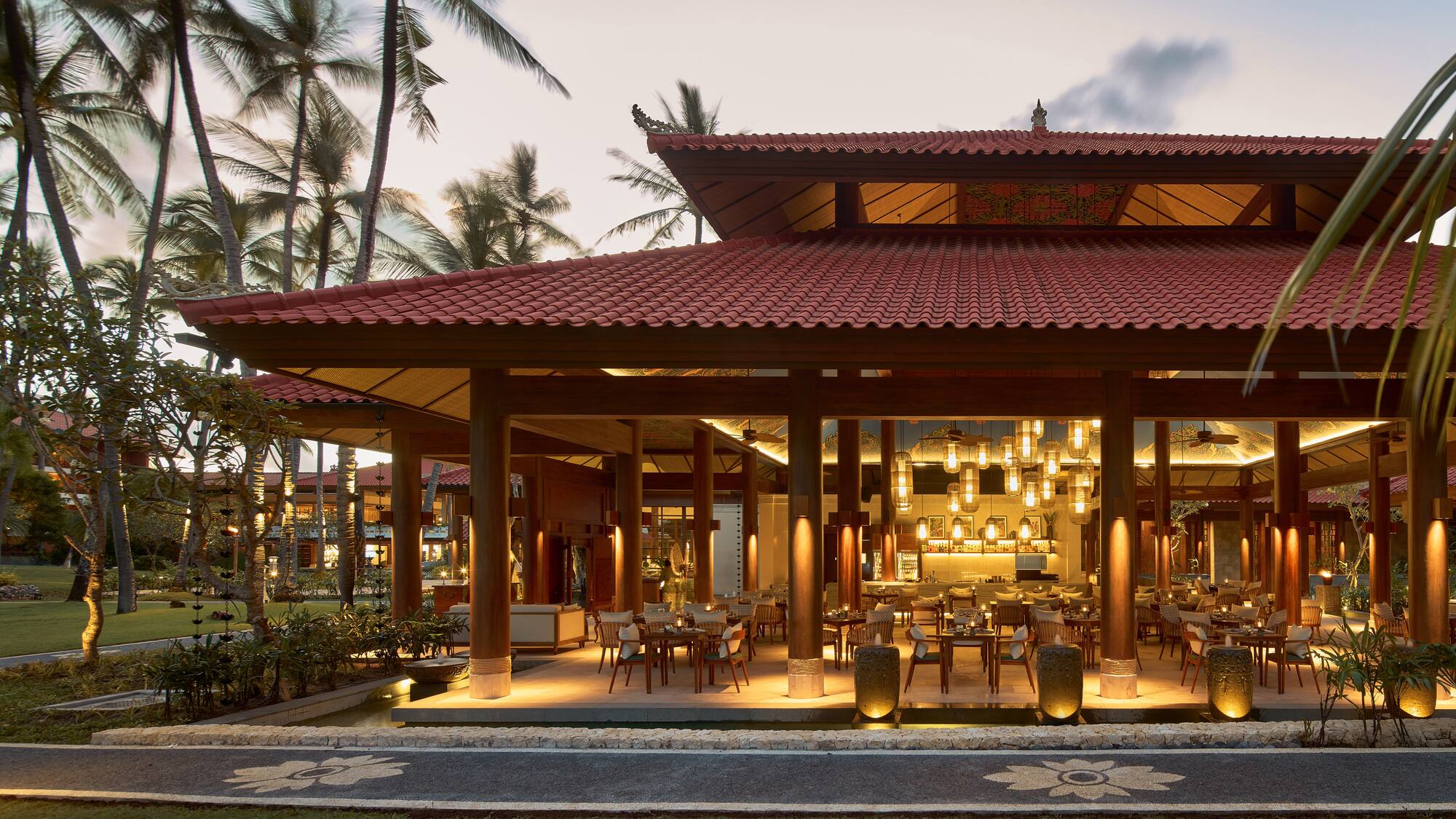 a restaurant with a red roof and a red tile roof