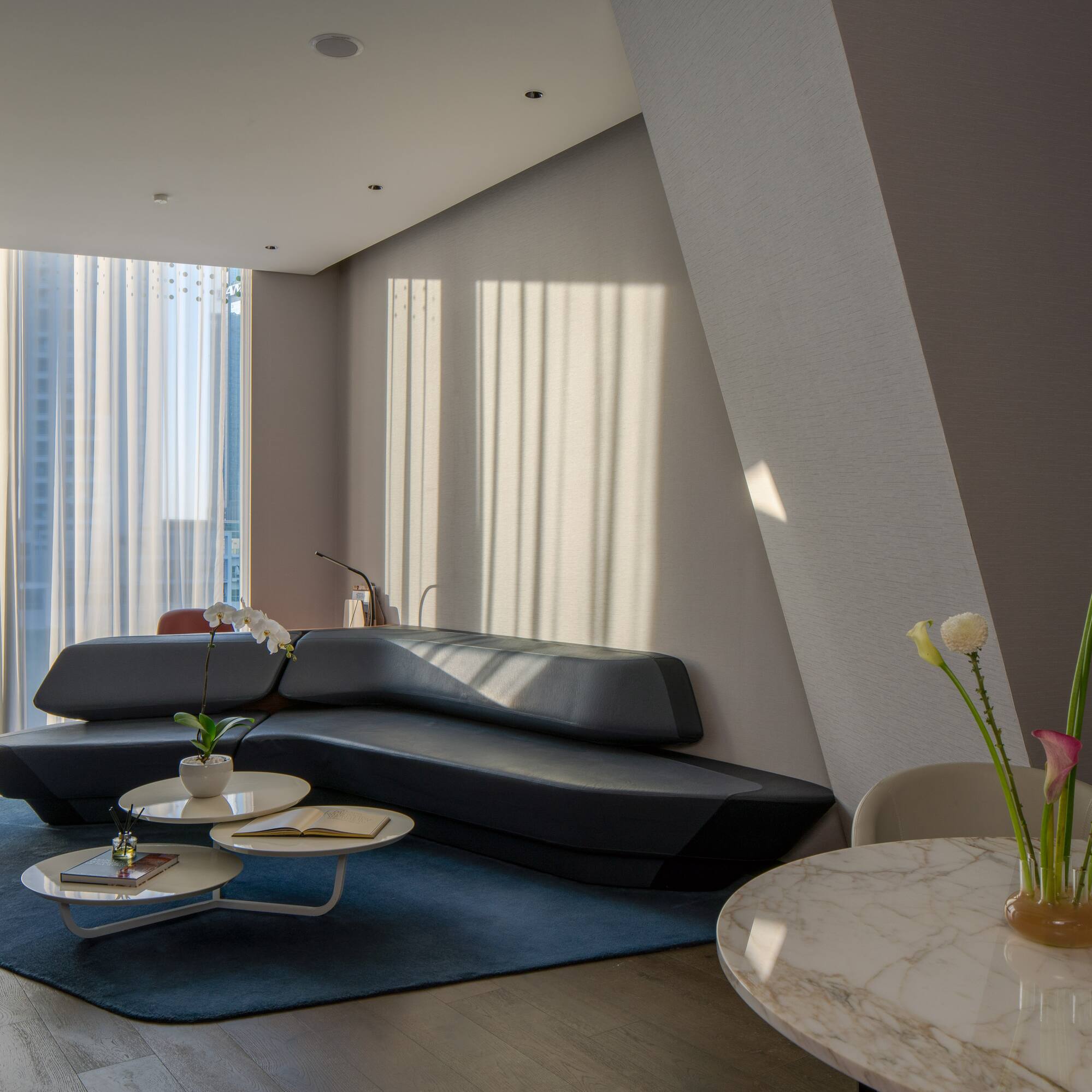 a living room with a couch and coffee table