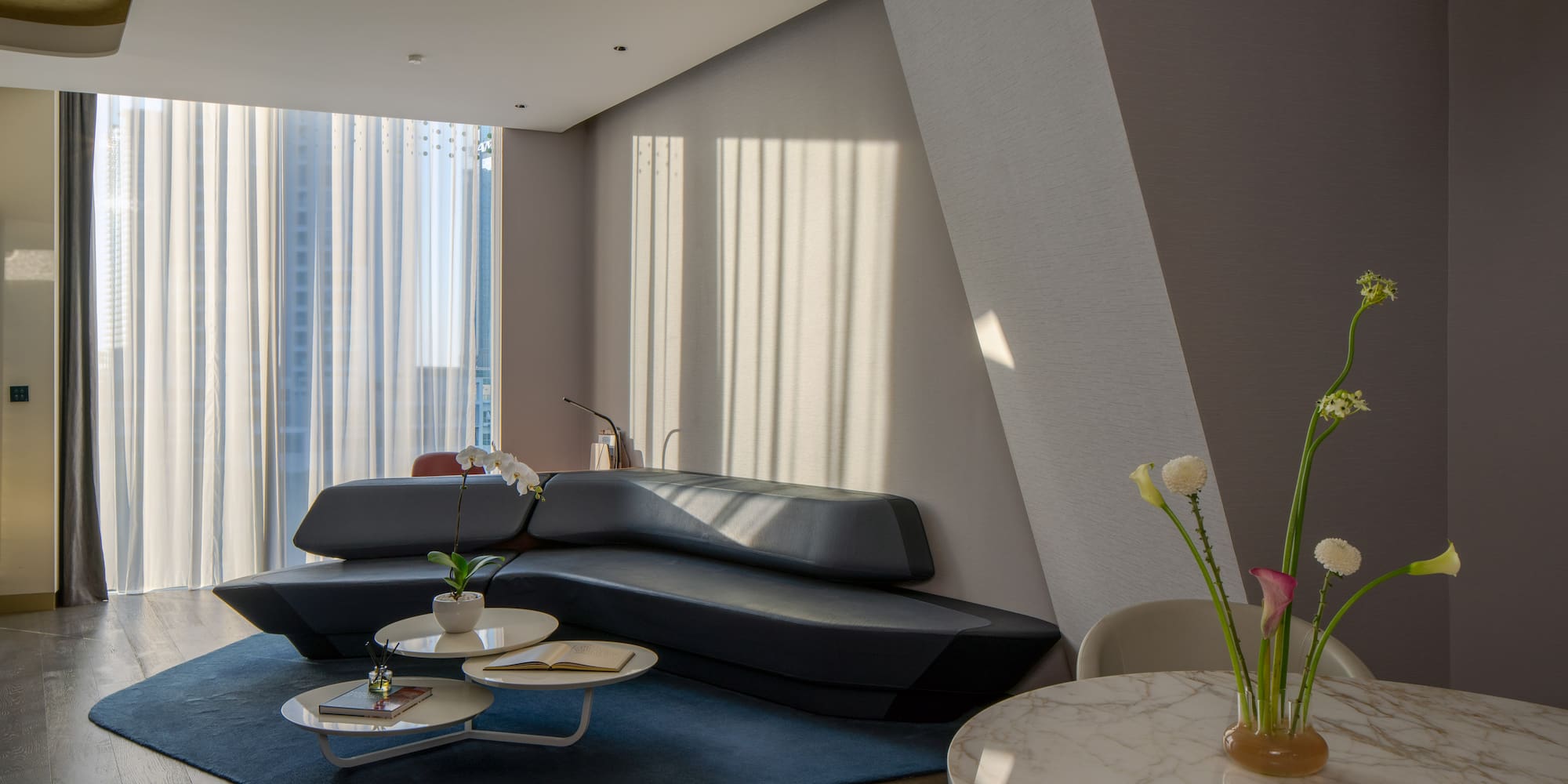 a living room with a couch and coffee table