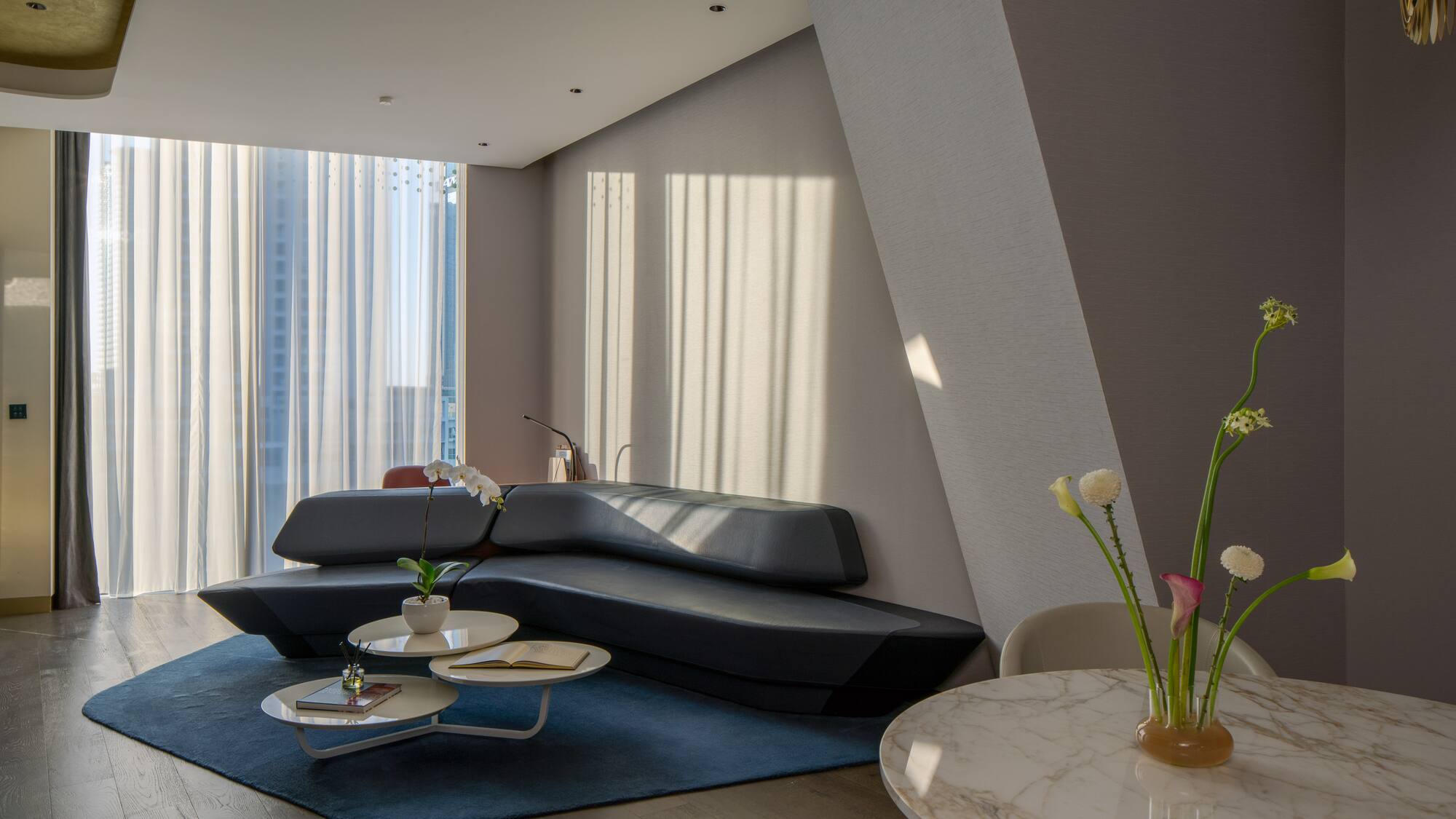 a living room with a couch and coffee table