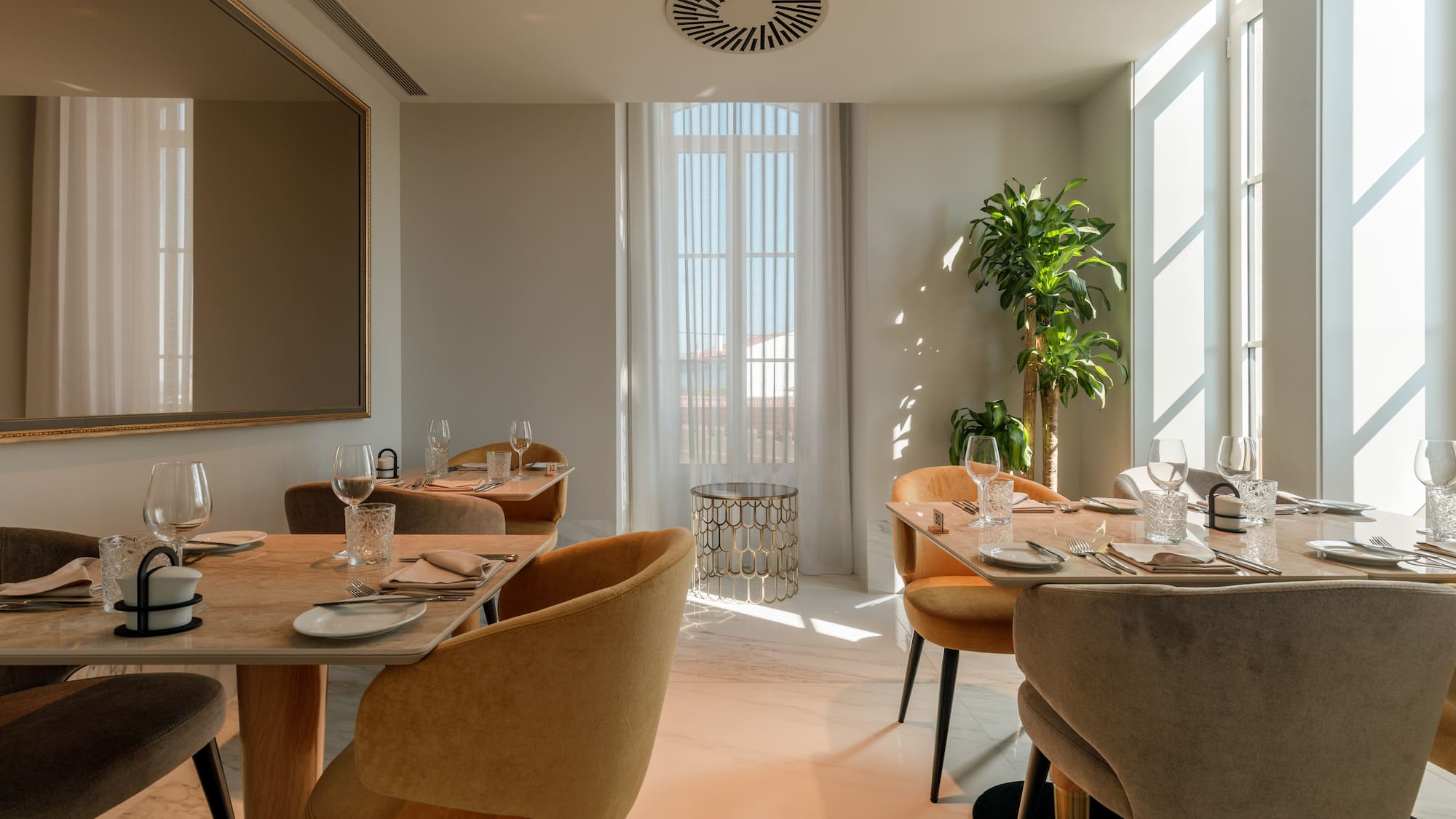 a room with tables and chairs