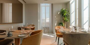 a room with tables and chairs