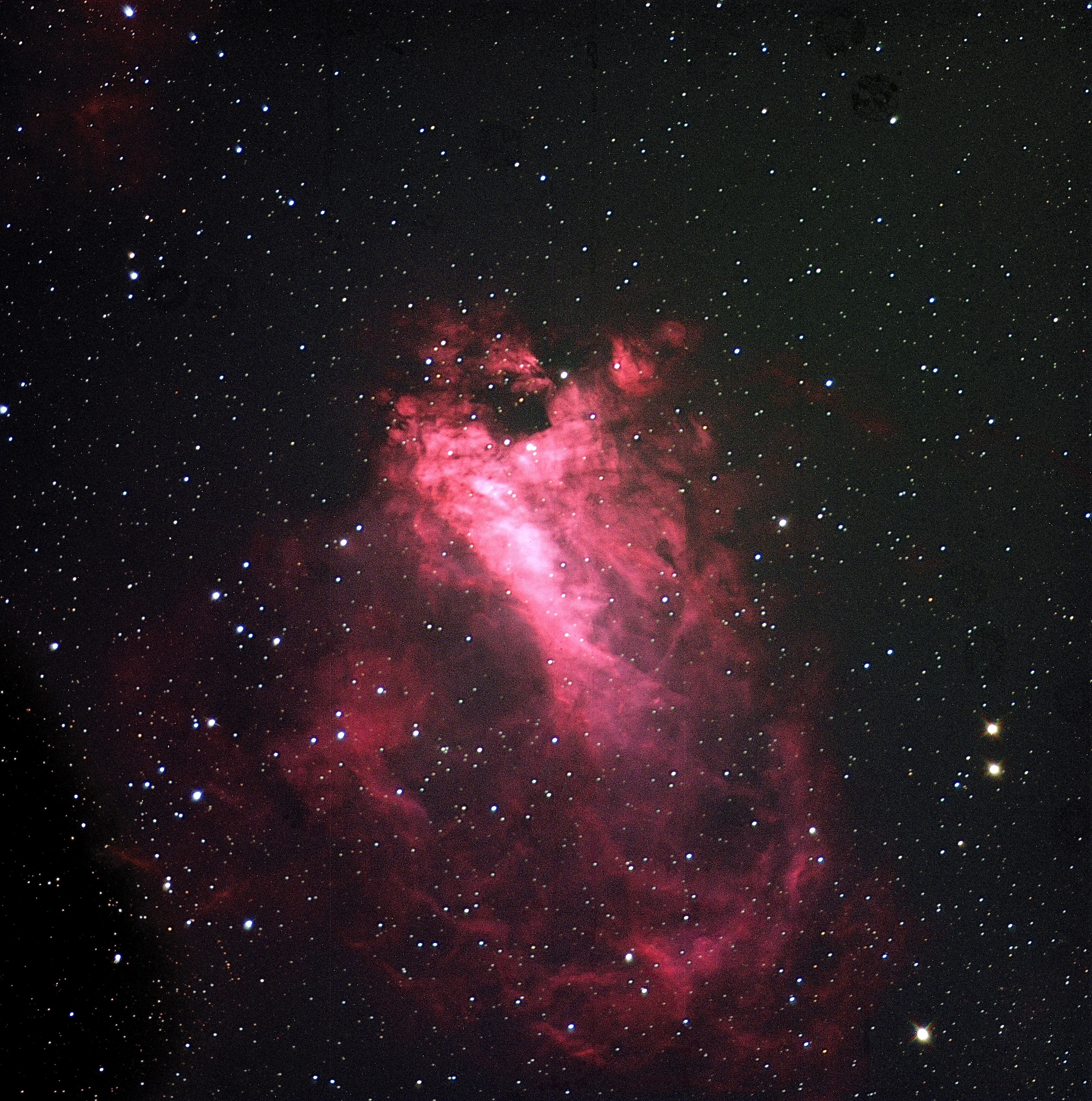 a pink and black sky with stars