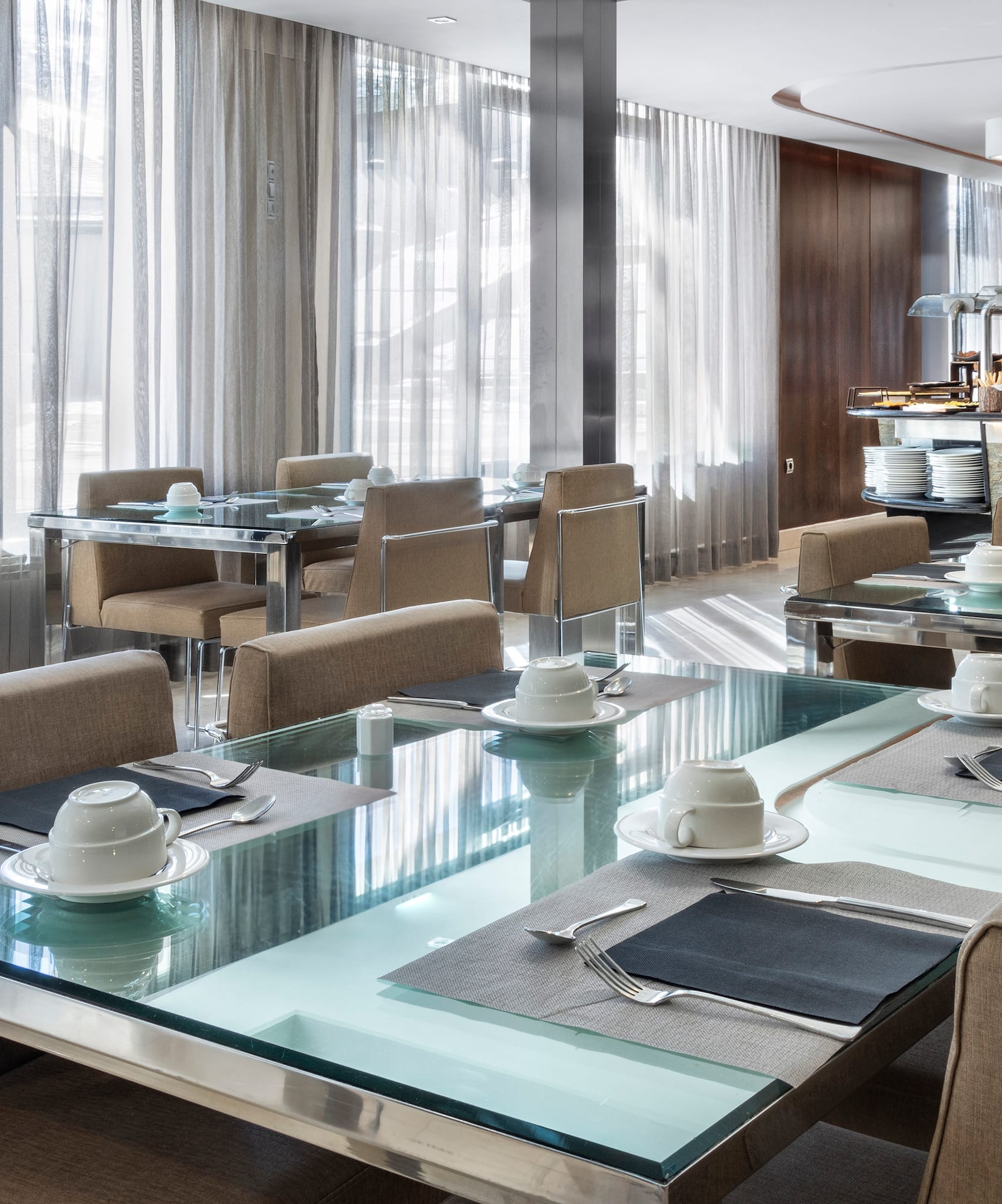 a restaurant with tables and chairs