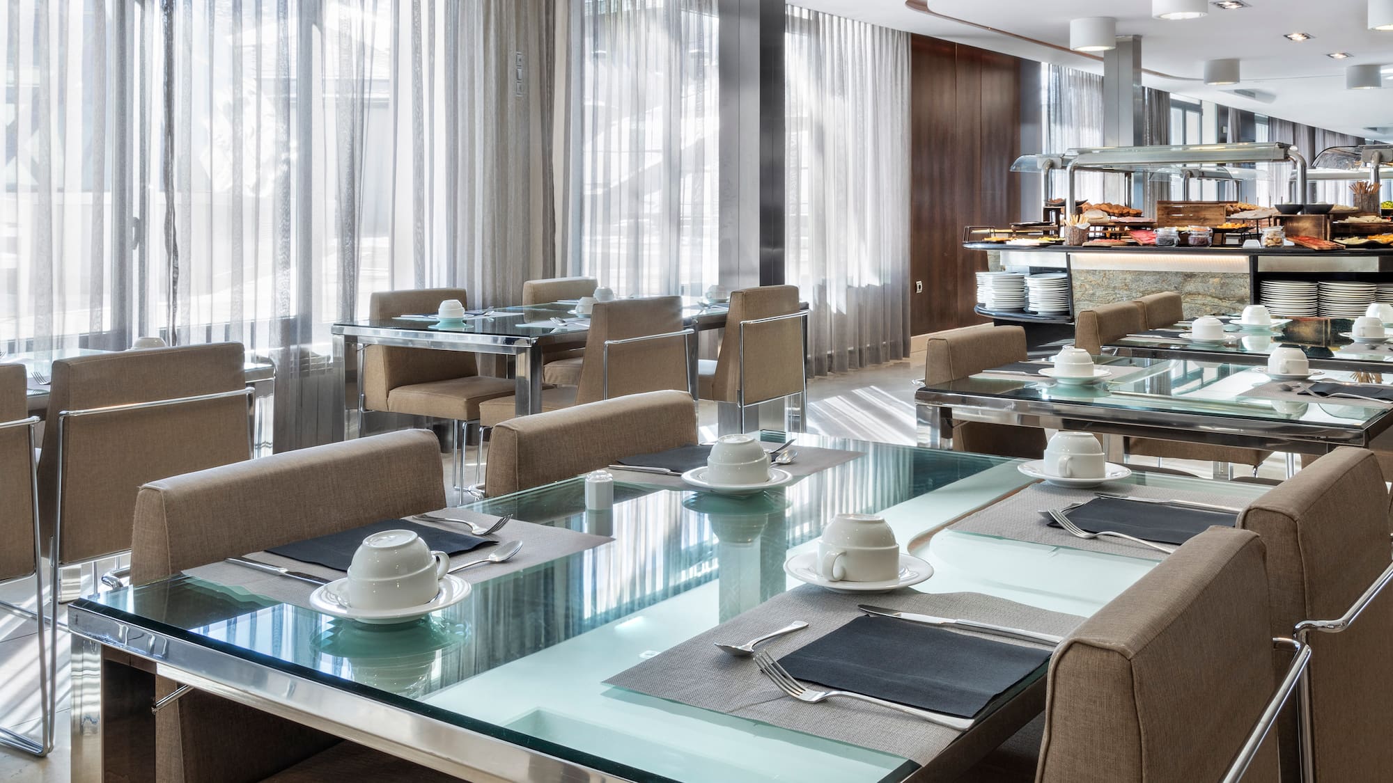 a restaurant with tables and chairs