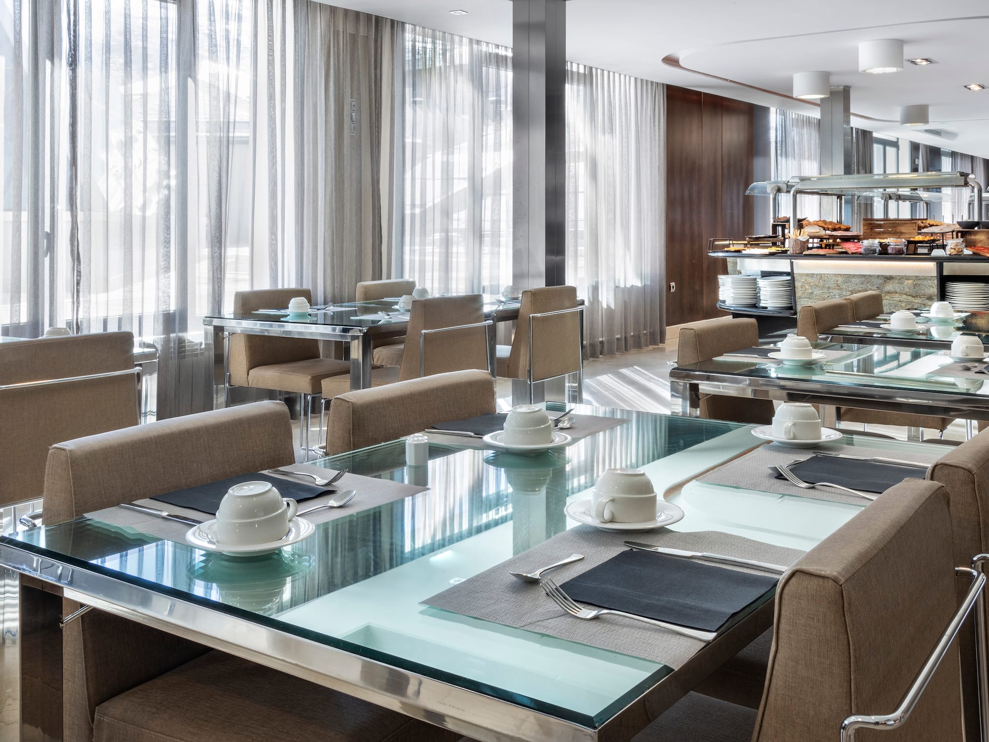 a restaurant with tables and chairs