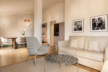 a living room with a couch and a table