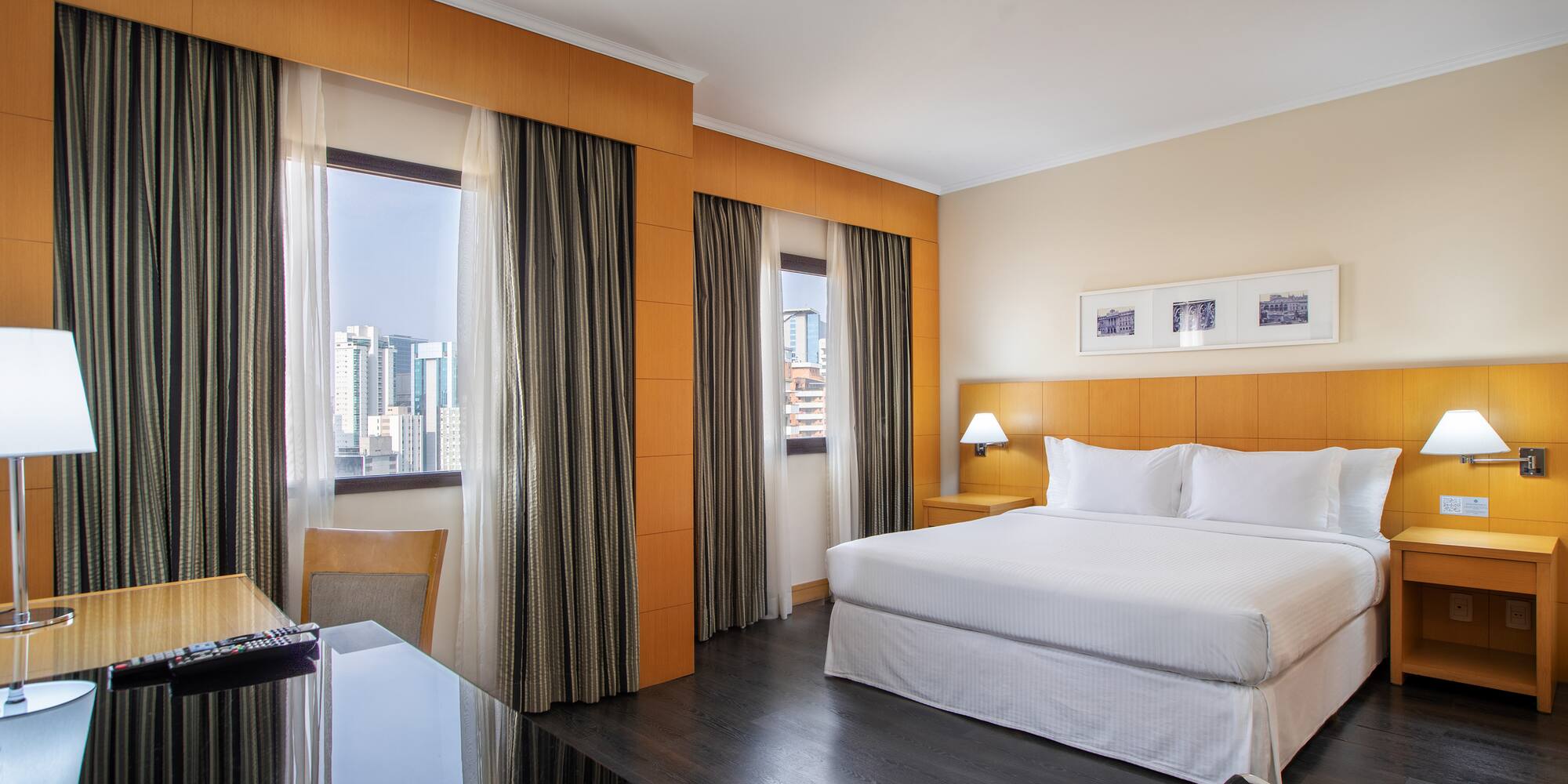 a room with a bed and a desk