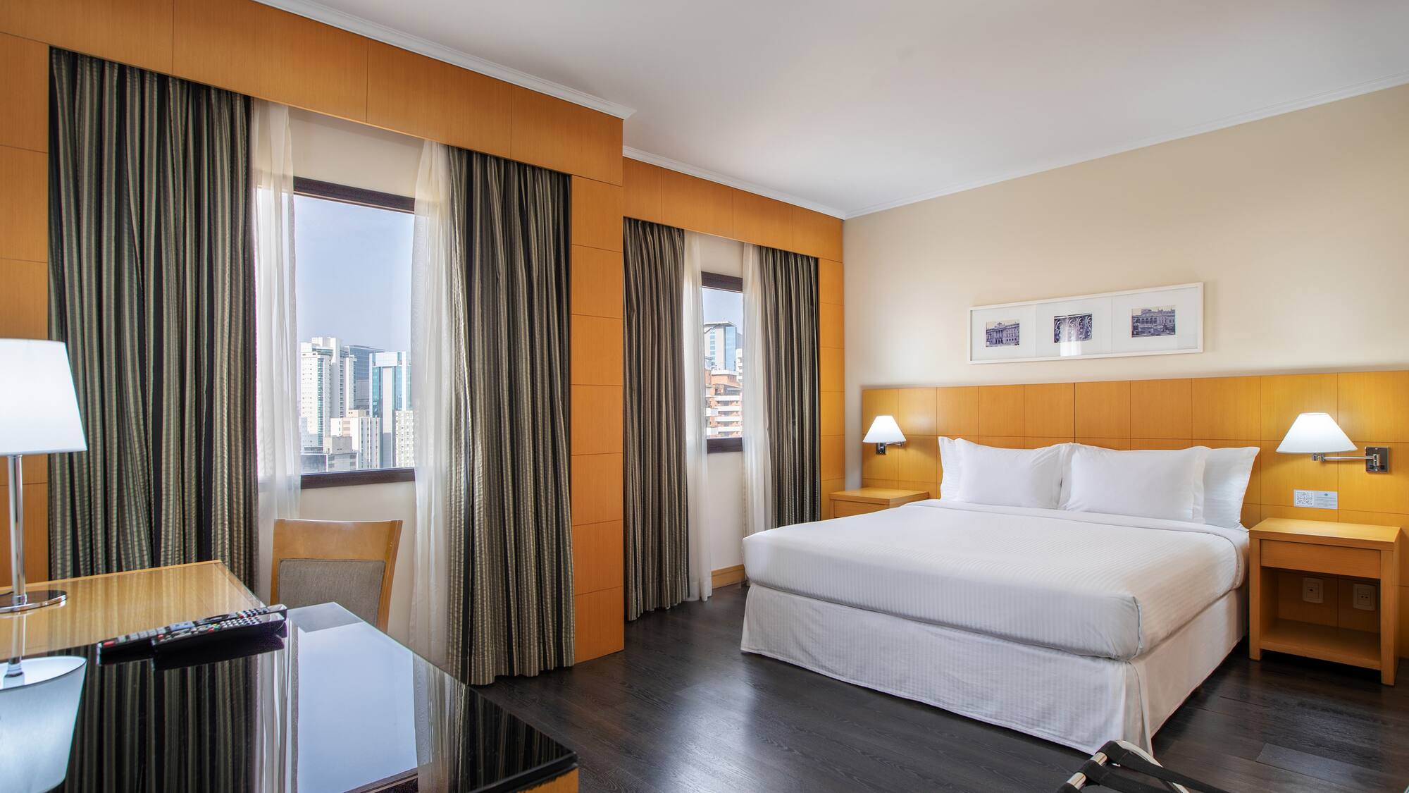 a room with a bed and a desk