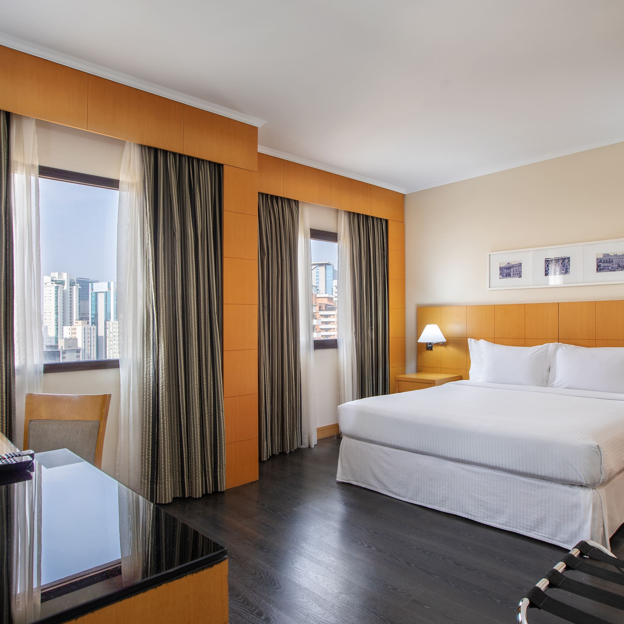 a room with a bed and a desk