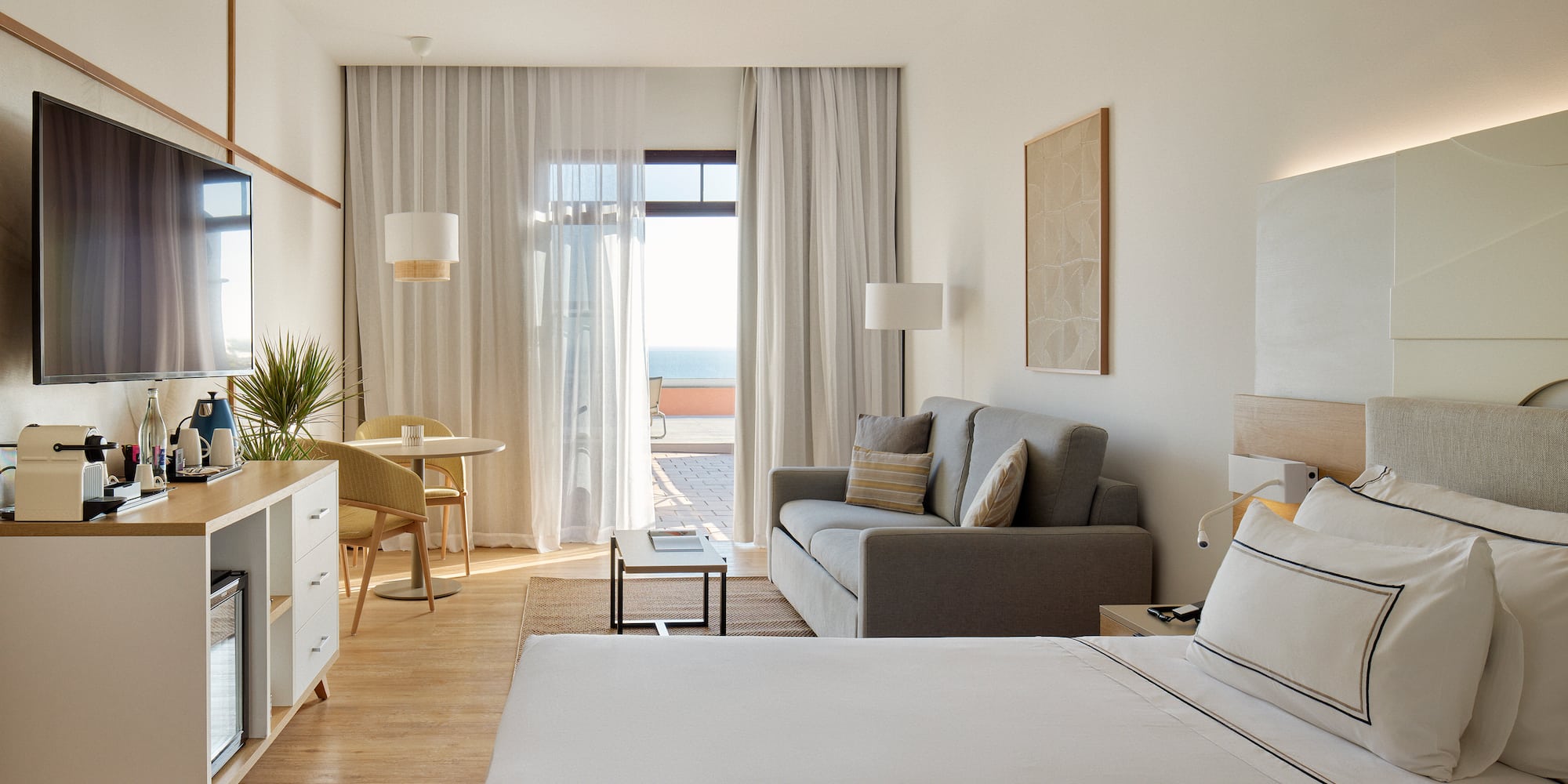 a room with a bed and a couch