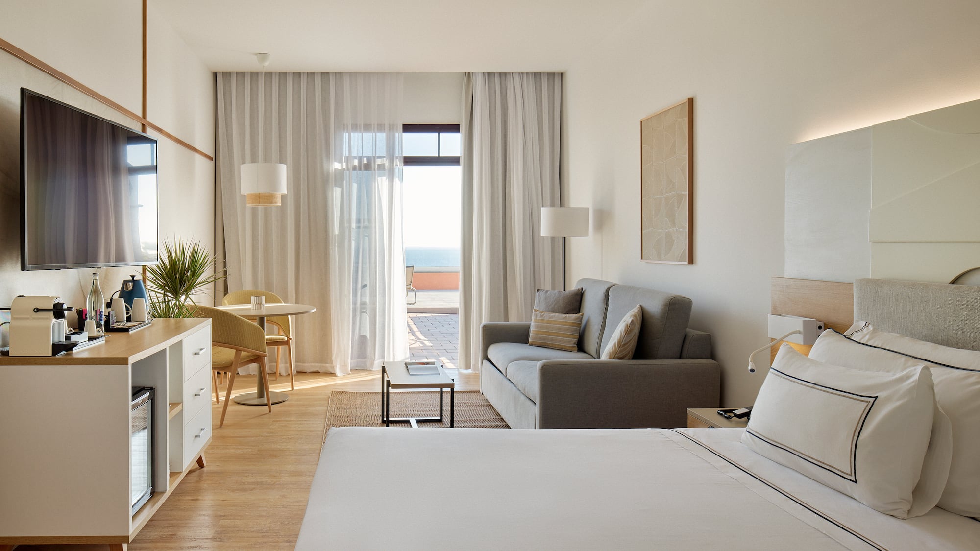 a room with a bed and a couch