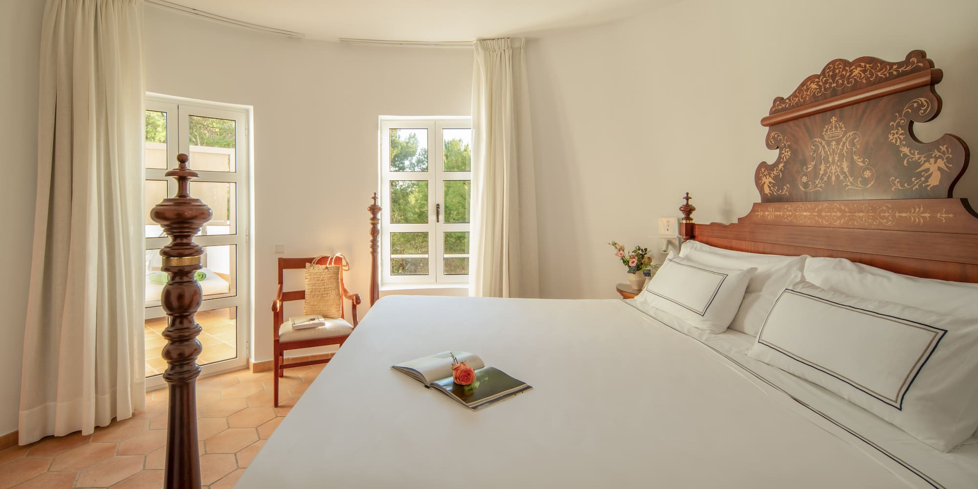 a bed with a book on it