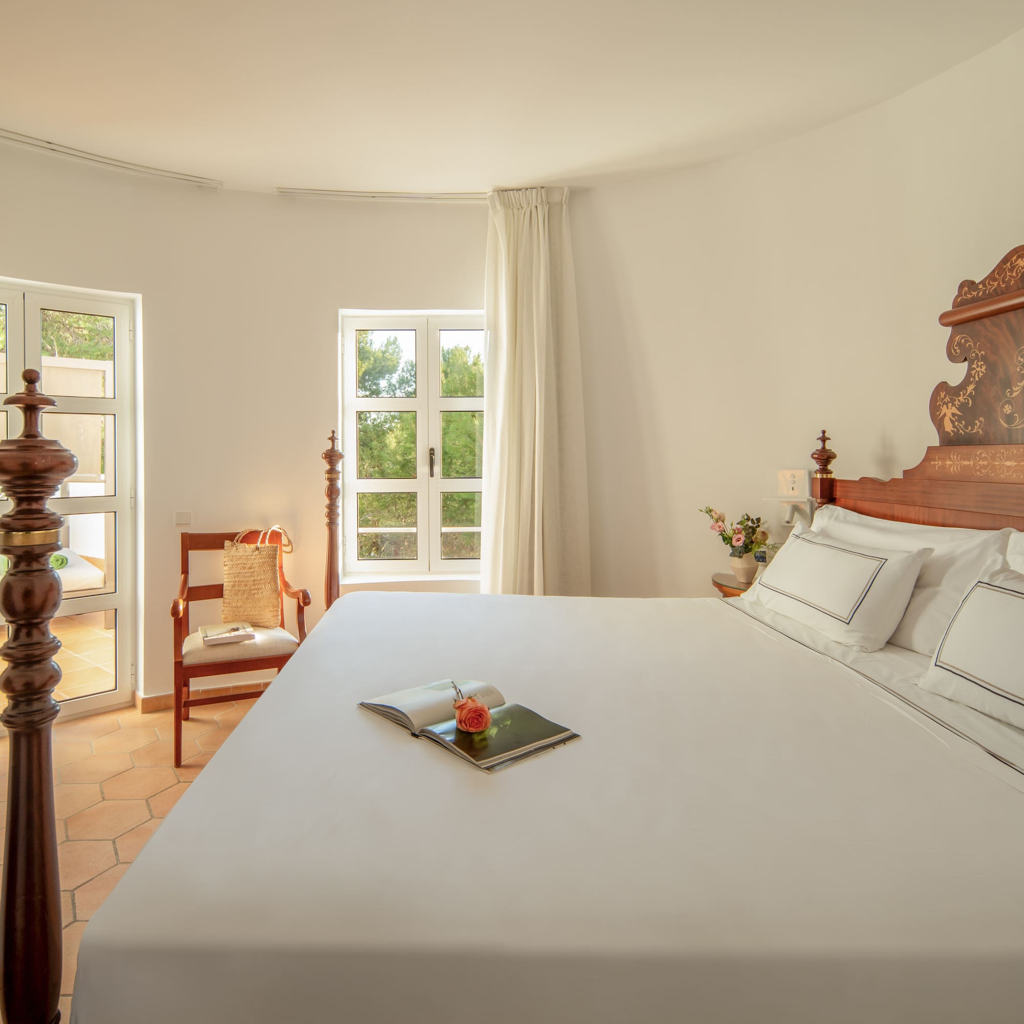 a bed with a book on it