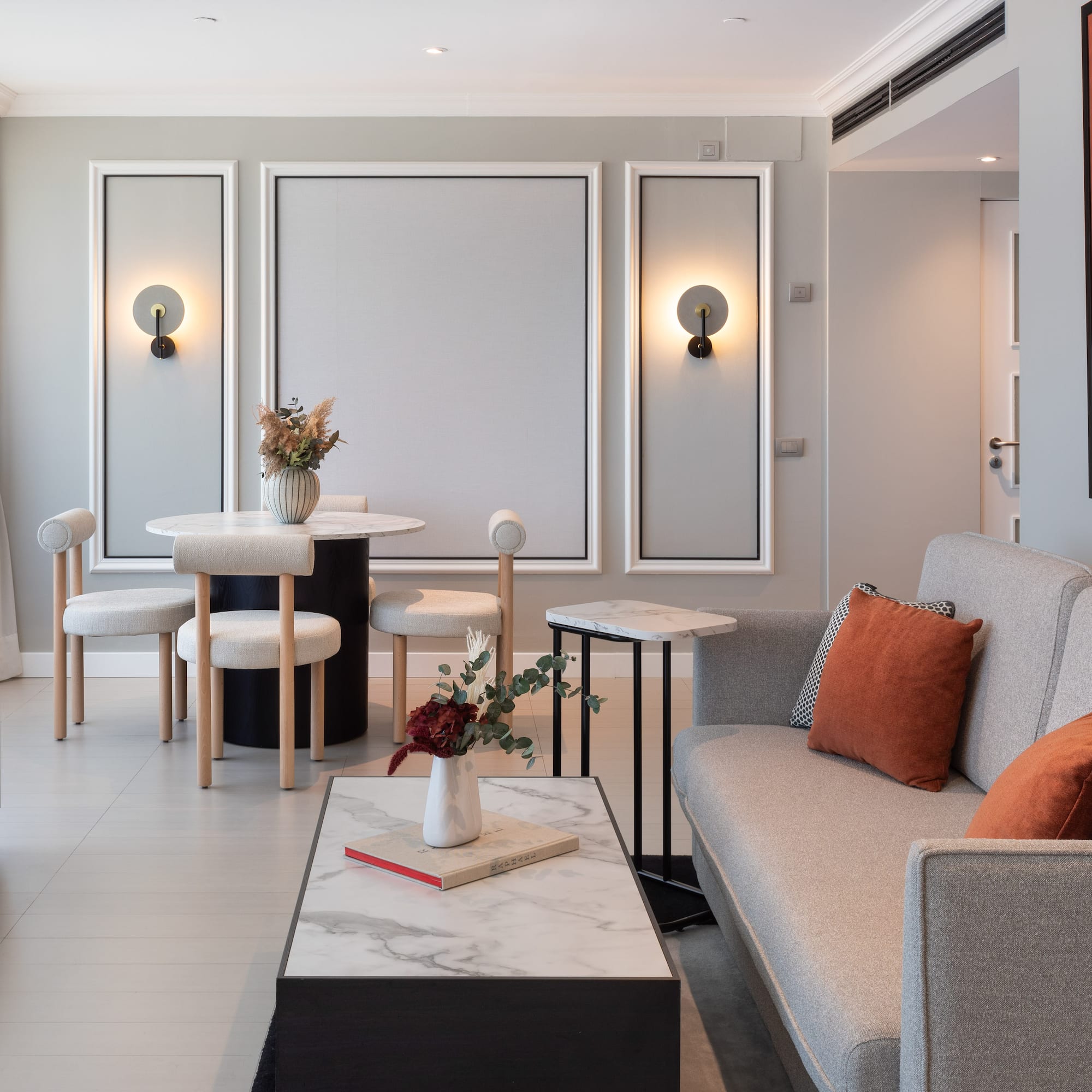 a living room with a couch and table