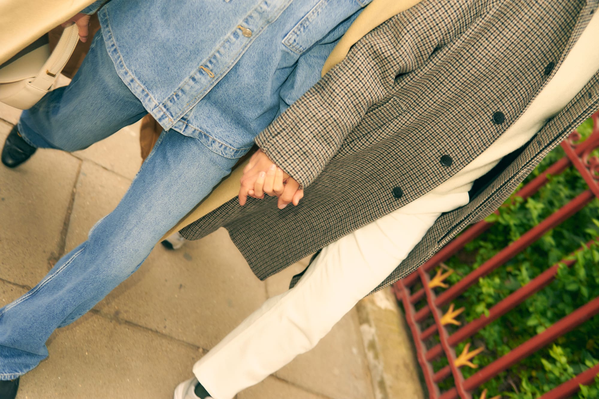 a man and woman holding hands