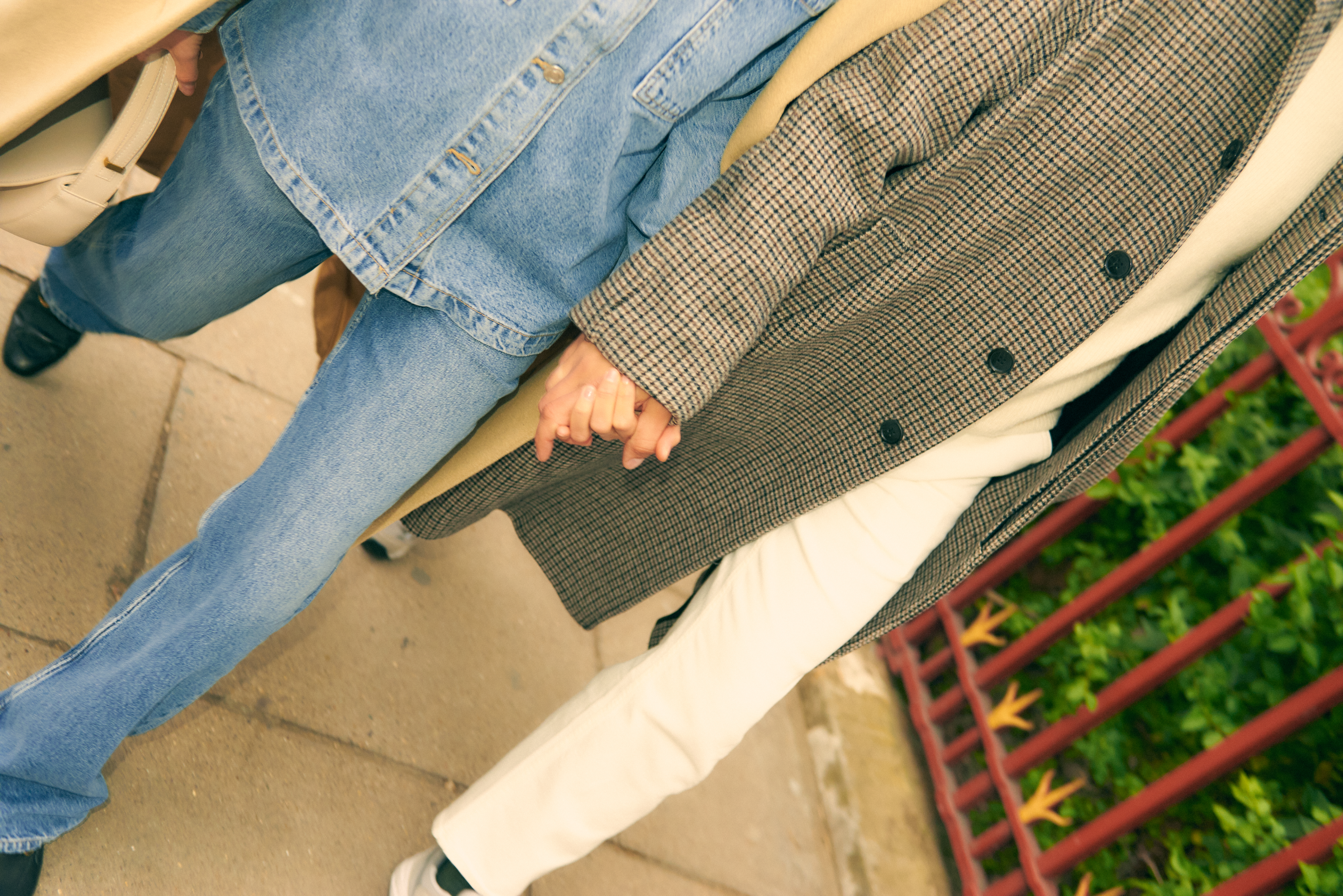 a man and woman holding hands