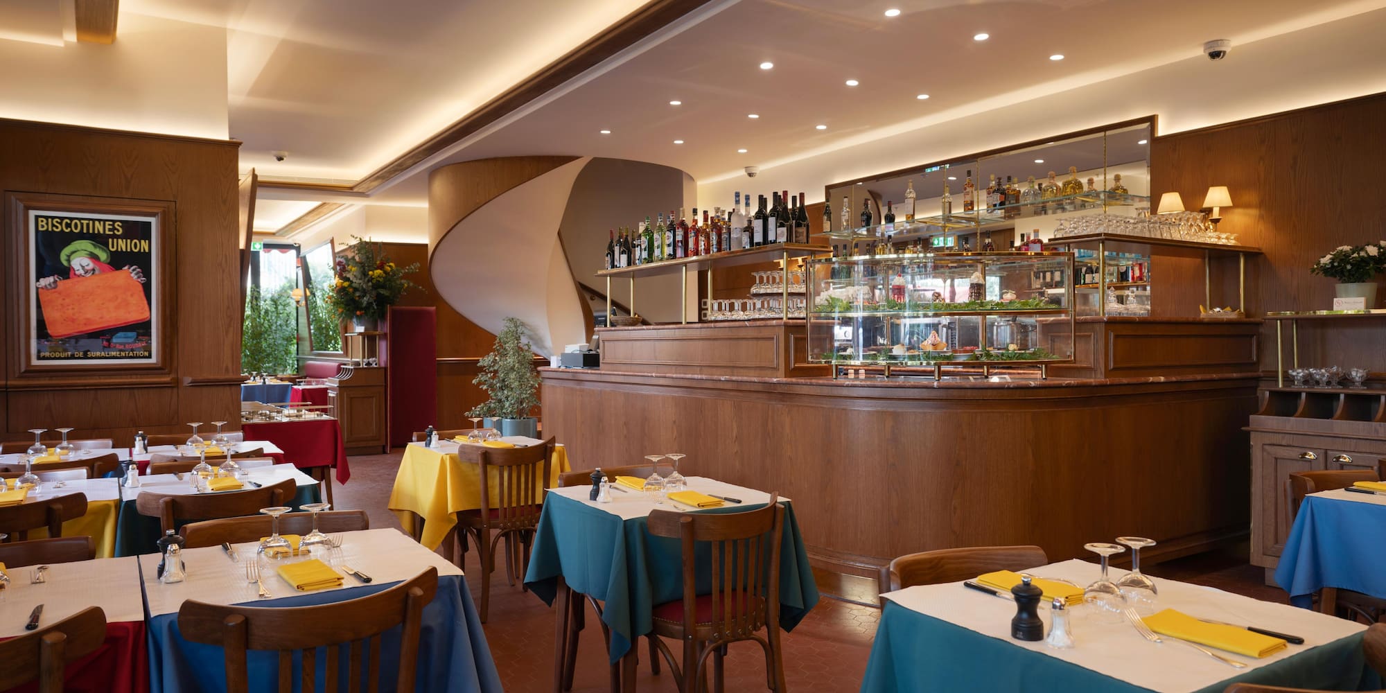 a restaurant with tables and chairs