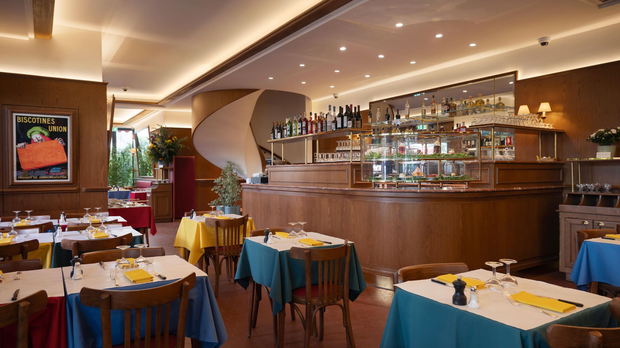 a restaurant with tables and chairs