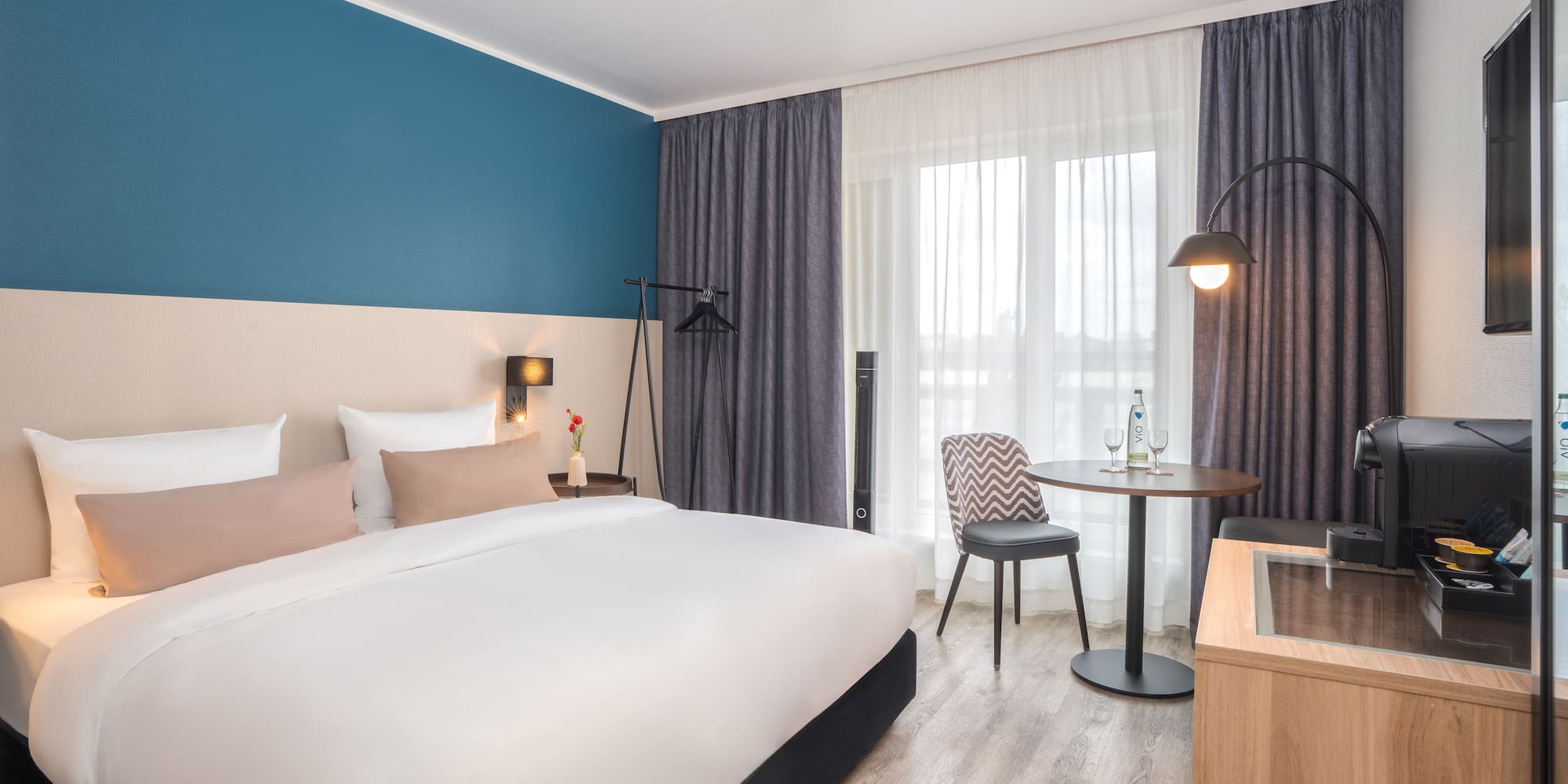 a room with a bed and a table