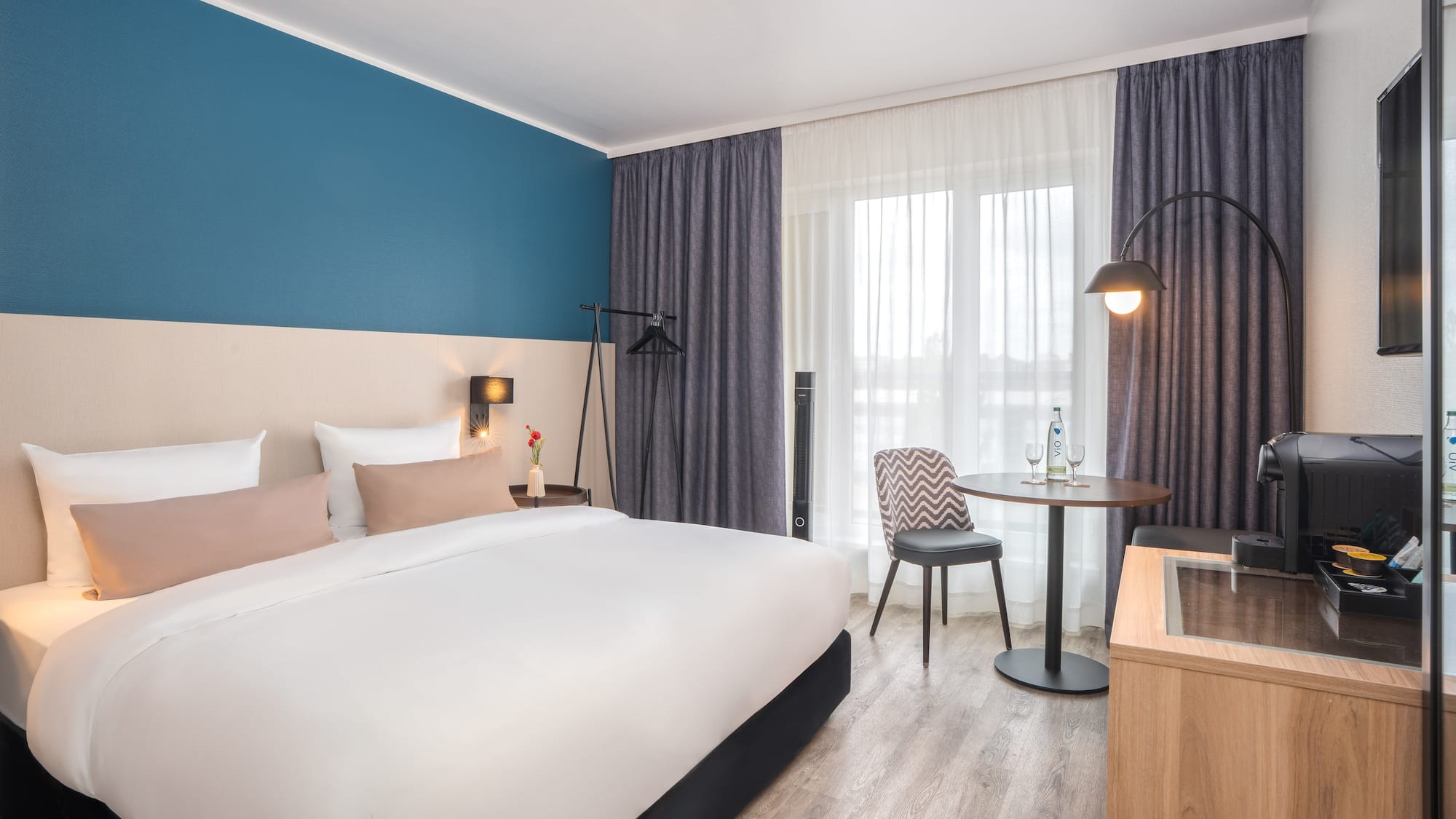 a room with a bed and a table