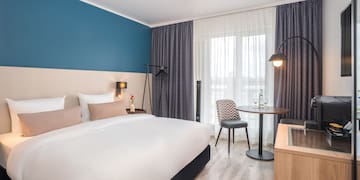 a room with a bed and a table