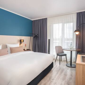 a room with a bed and a table