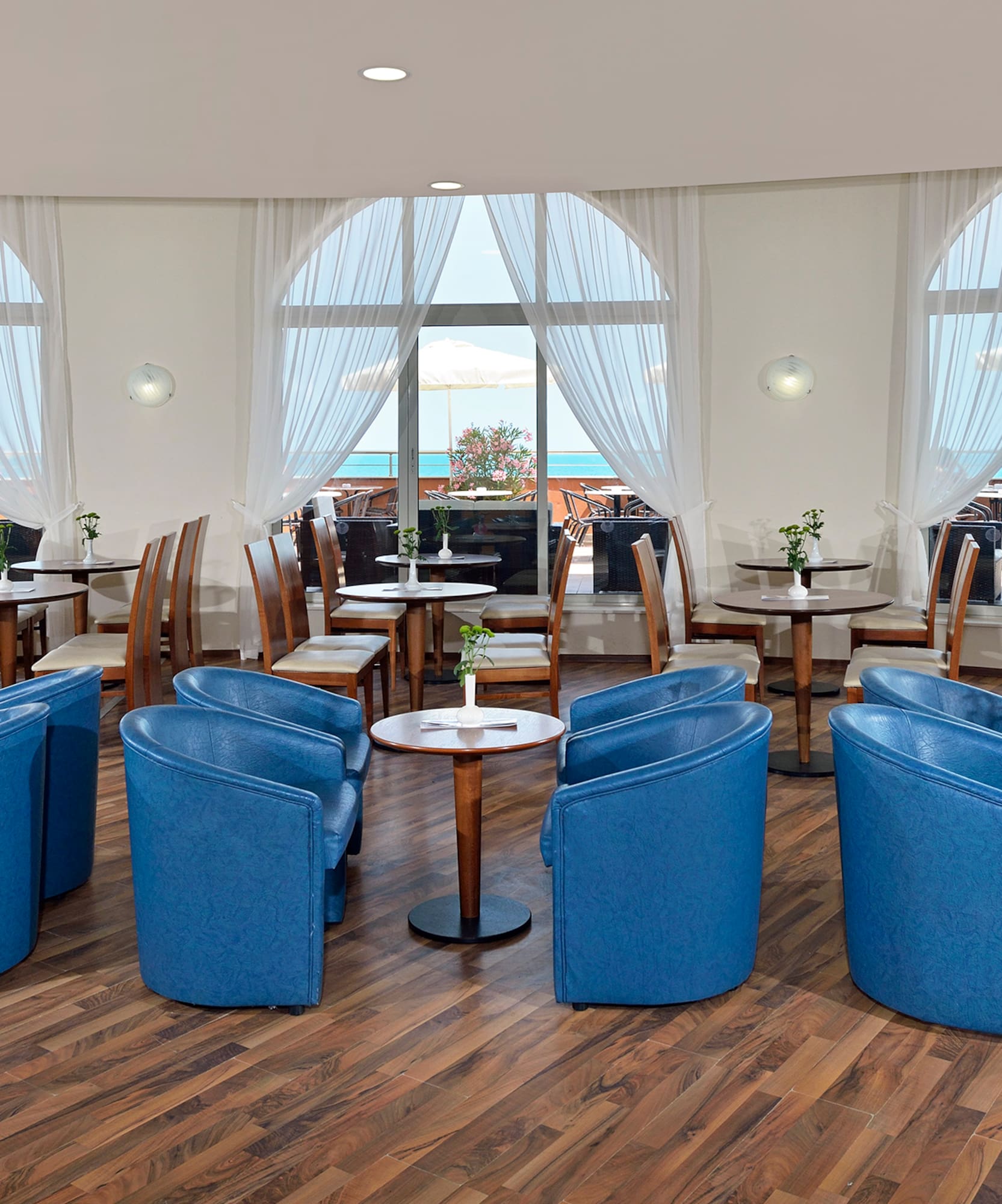 a room with tables and chairs