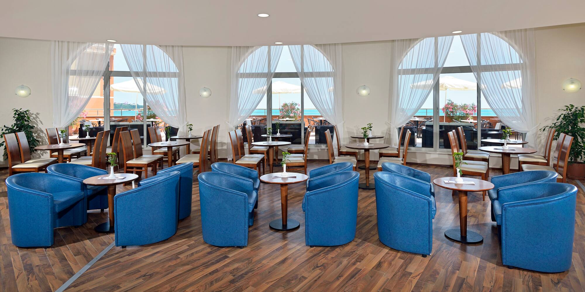 a room with tables and chairs