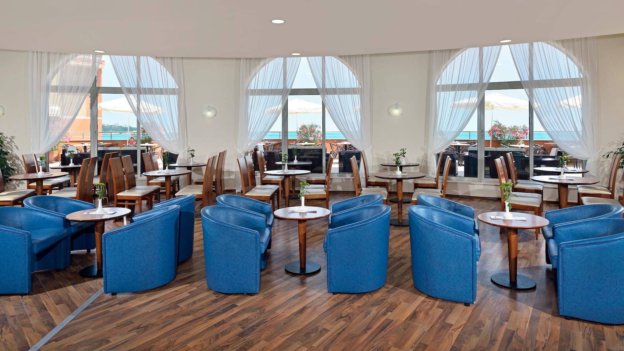 a room with tables and chairs