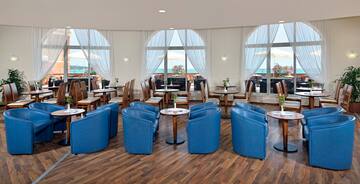 a room with tables and chairs