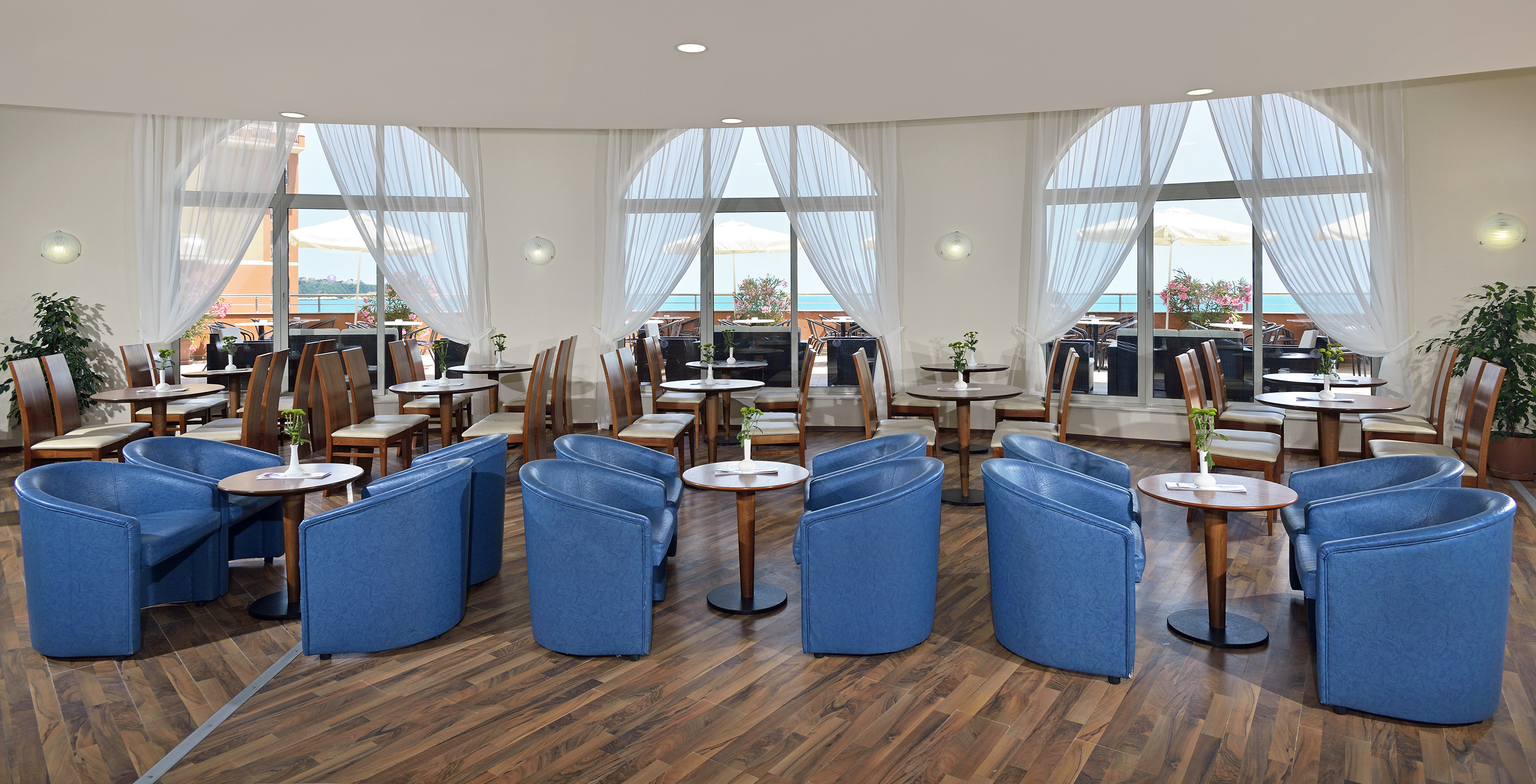 a room with tables and chairs