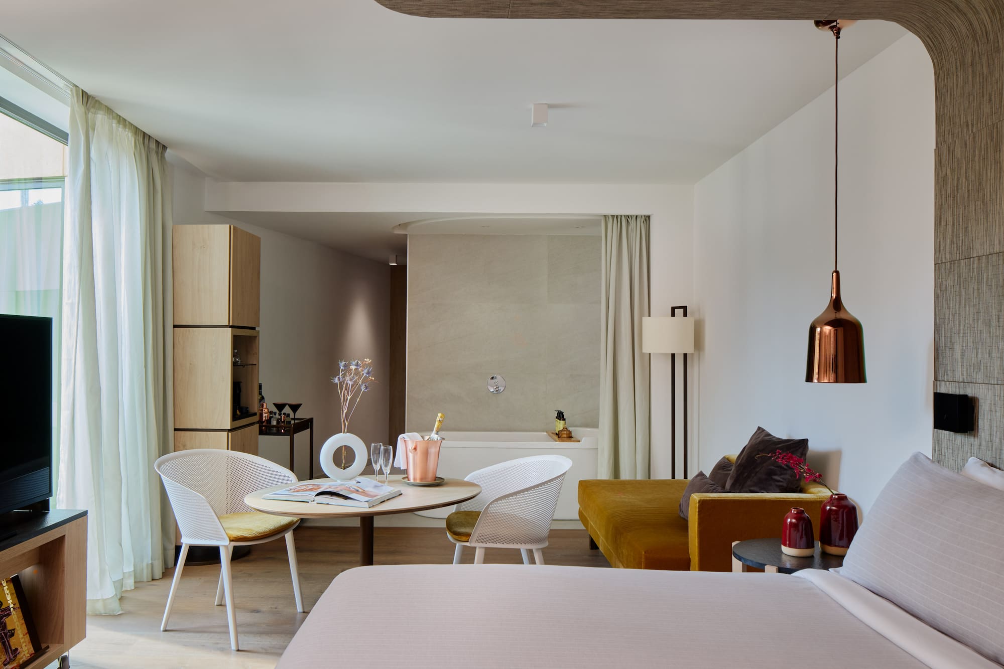 a room with a bed and a table