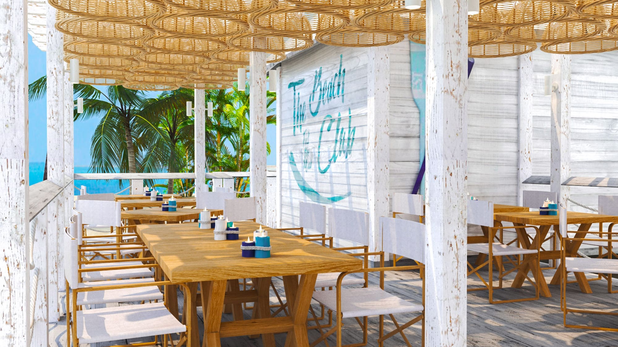 a table and chairs on a beach restaurant
