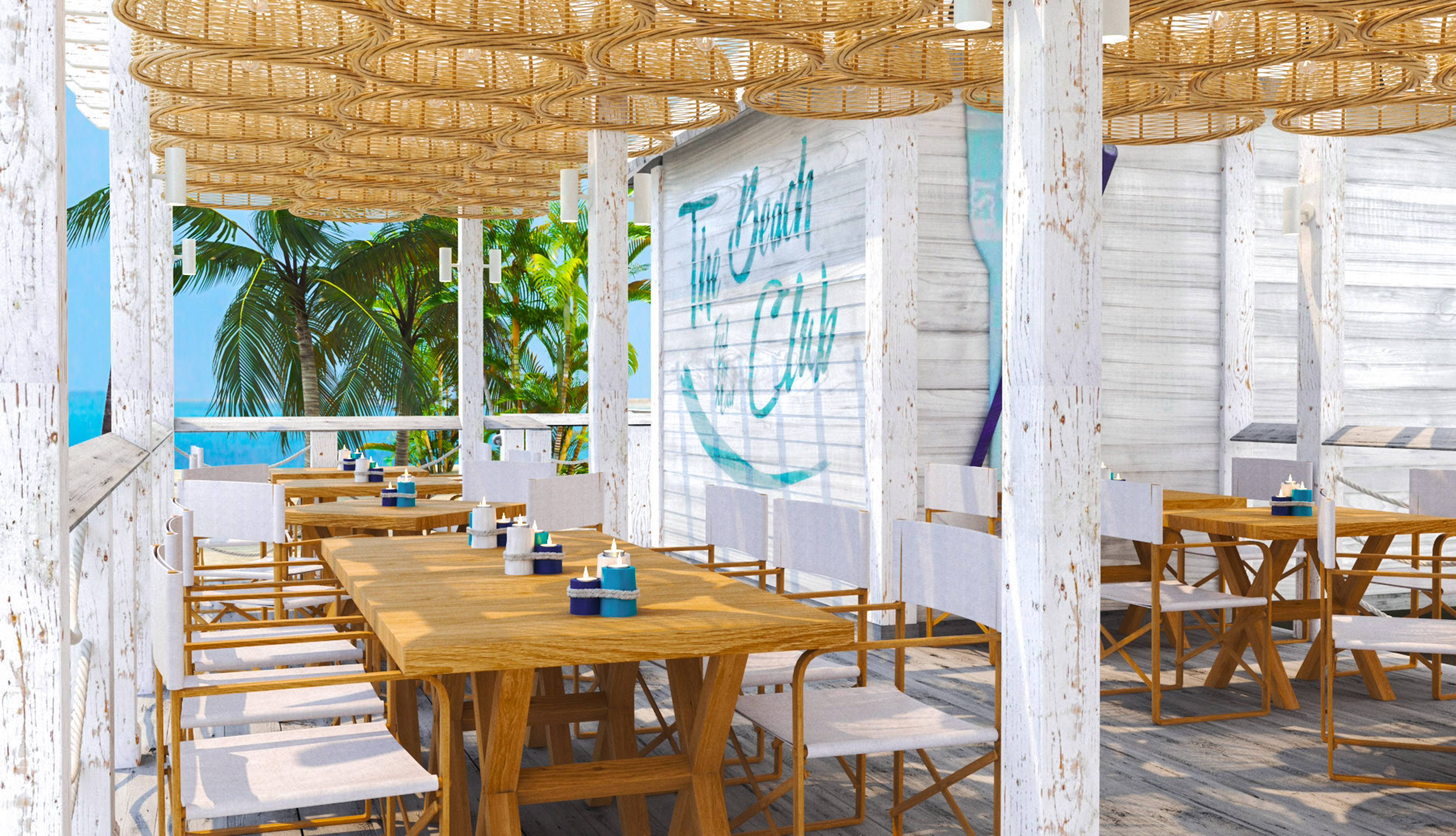 a table and chairs on a beach restaurant