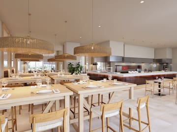 a restaurant with tables and chairs