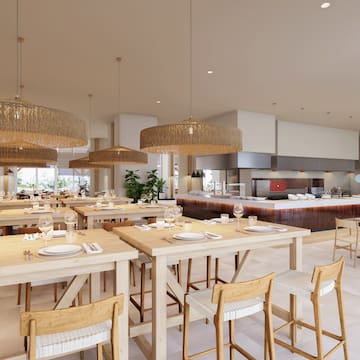 a restaurant with tables and chairs