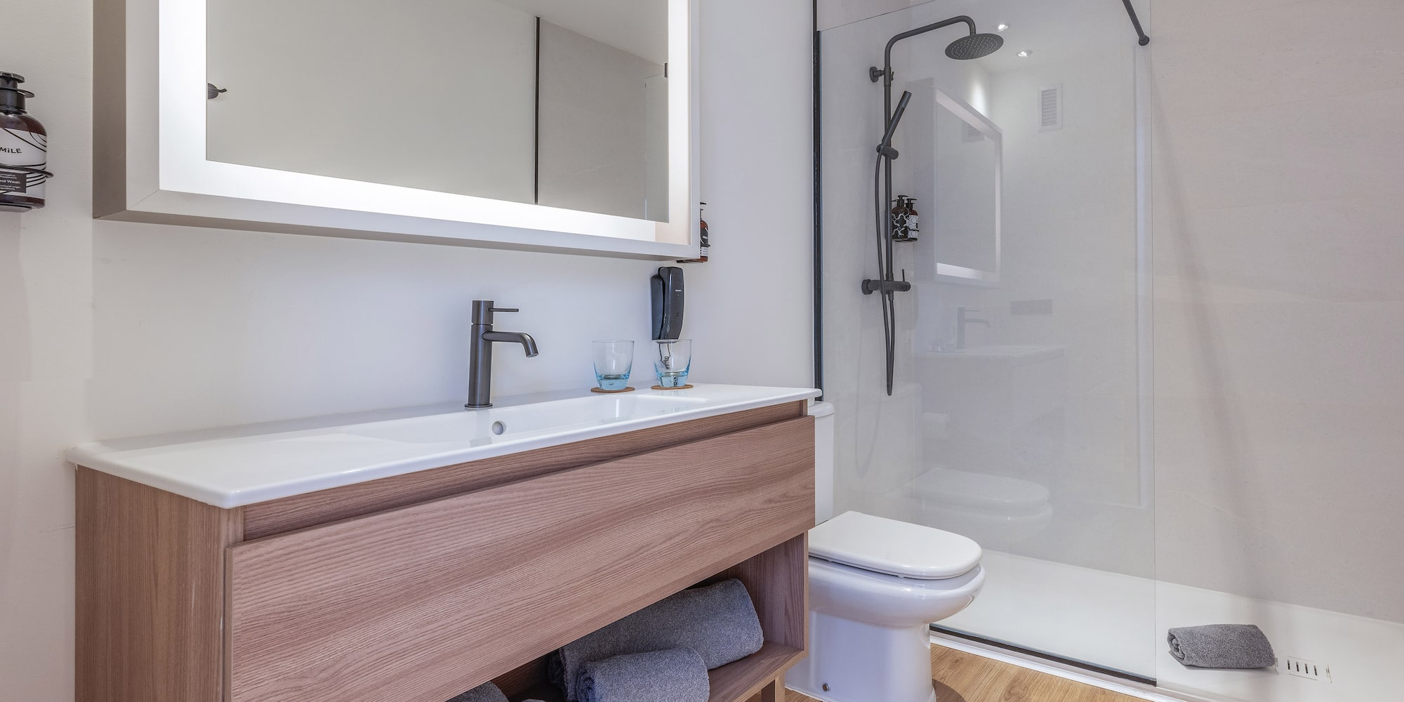 a bathroom with a mirror and a sink