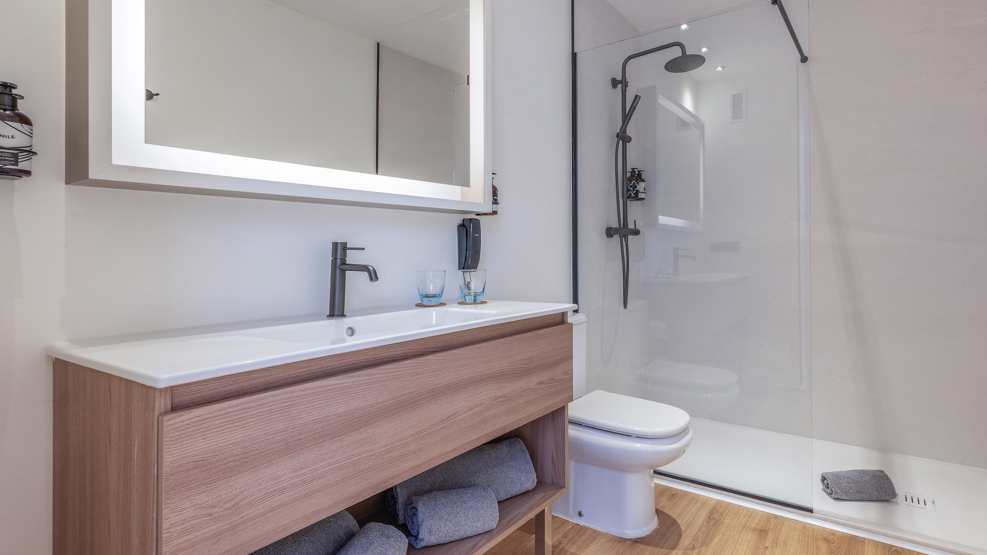 a bathroom with a mirror and a sink