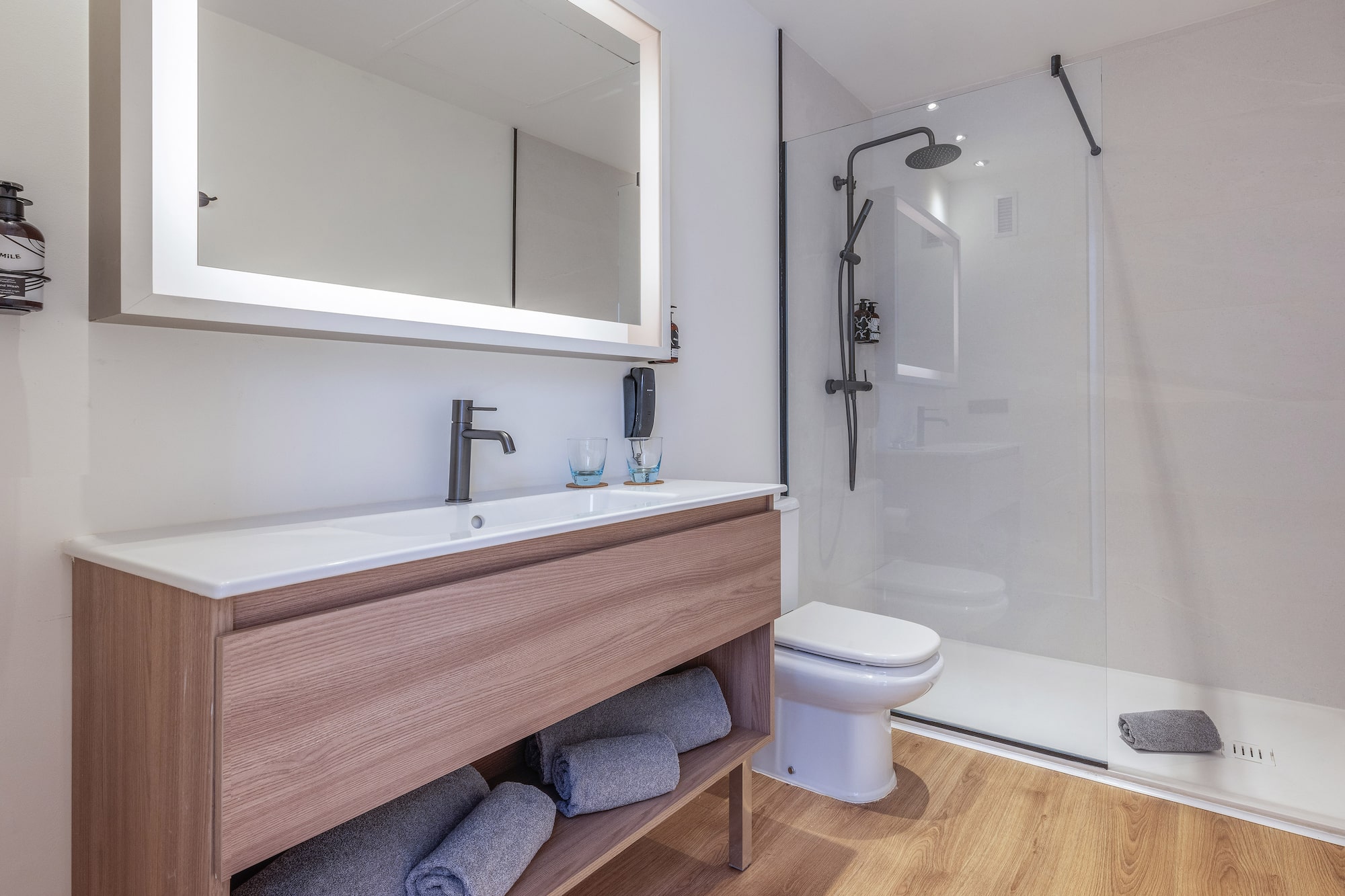 a bathroom with a mirror and a sink